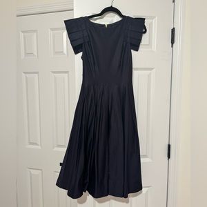 Ted Baker navy fit and flare dress with shoulder detail.